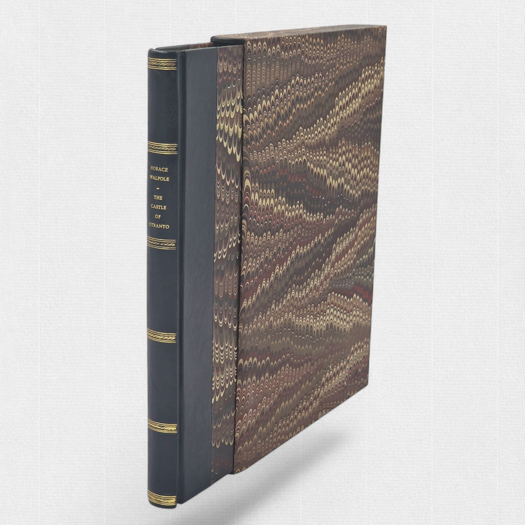 Angled view of The Castle of Otranto with marbled slipcase and half-leather binding by Woodbank Press.