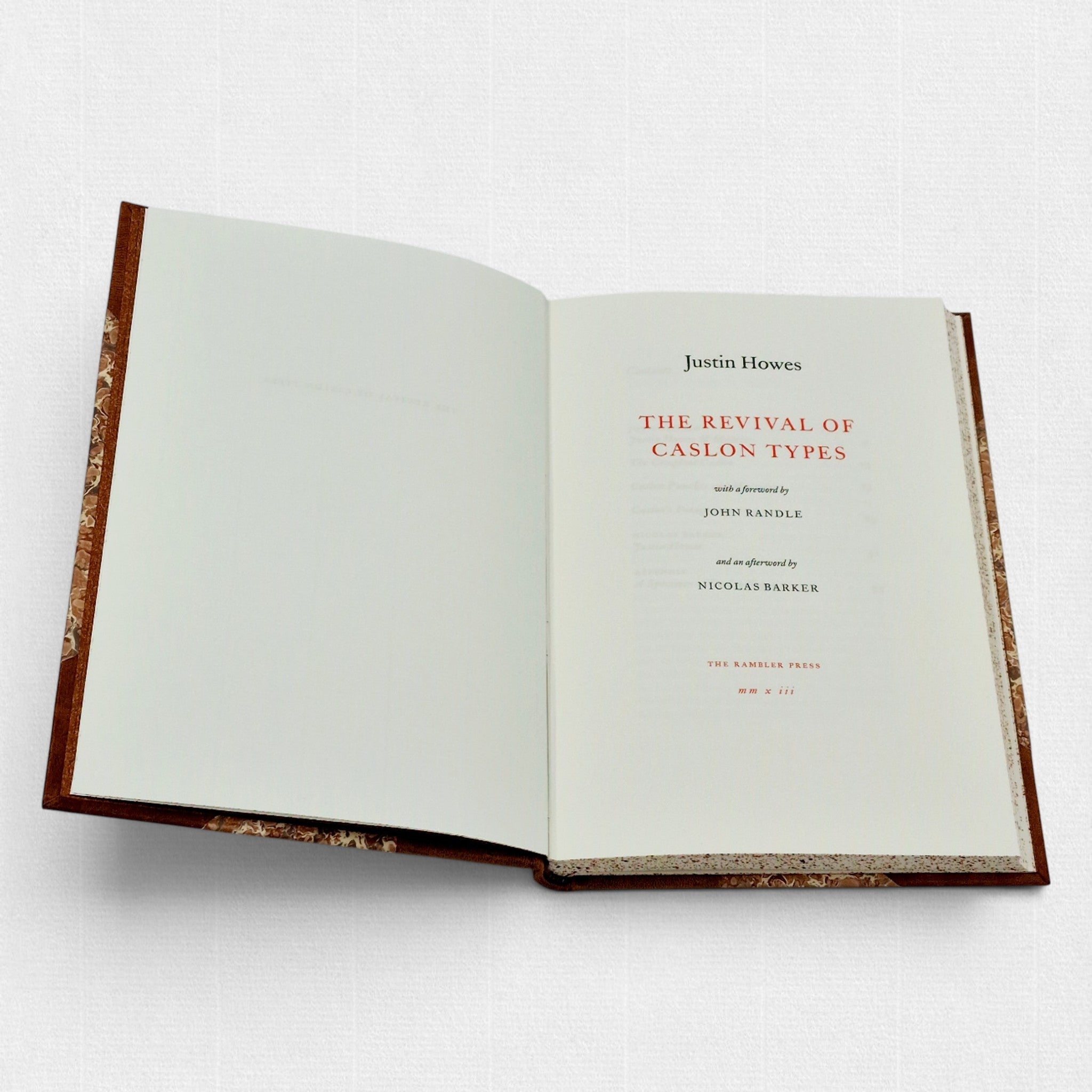 Interior pages of The Revival of Caslon Types, displaying refined typography, generous margins, and classical page proportions.