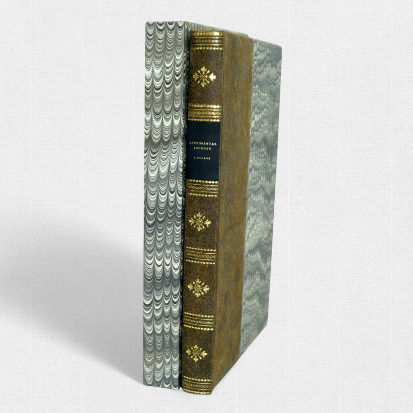 Fine press edition of A Sentimental Journey Through France and Italy by Laurence Sterne, shown with custom marbled slipcase by Woodbank Press.