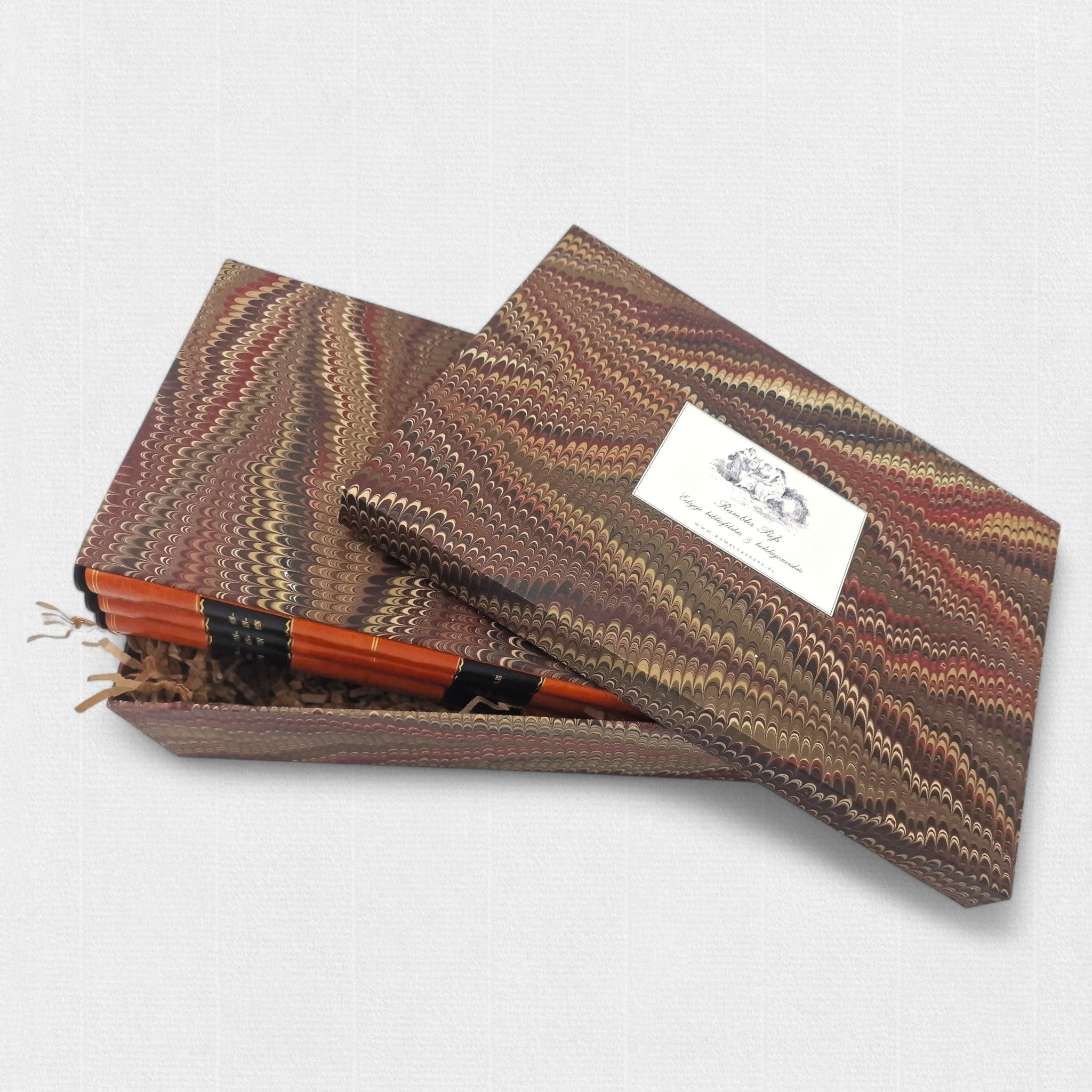 Marbled presentation box containing the three-volume fine press edition of Frankenstein.