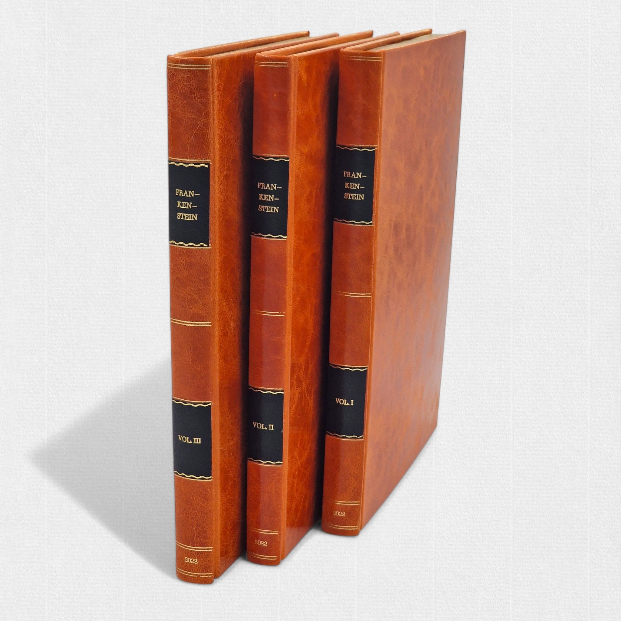 Three leather-bound volumes of Mary Shelley’s Frankenstein from a limited Woodbank Press edition.