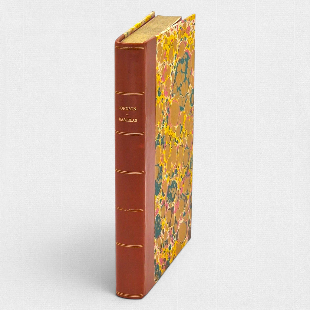 Rasselas by Samuel Johnson, fine press collector's edition by Woodbank Press, hand-bound in half leather with marbled paper boards, gilt spine and Conqueror Laid paper.